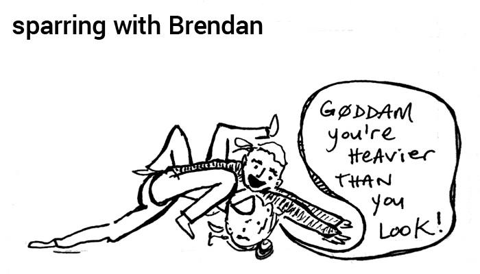 jiu jitsu | ericaricardo.com caption: sparring with Brendan | picture: erica has Brendan in side control, Brendan says, 'g0ddam you're heavier than you look!''